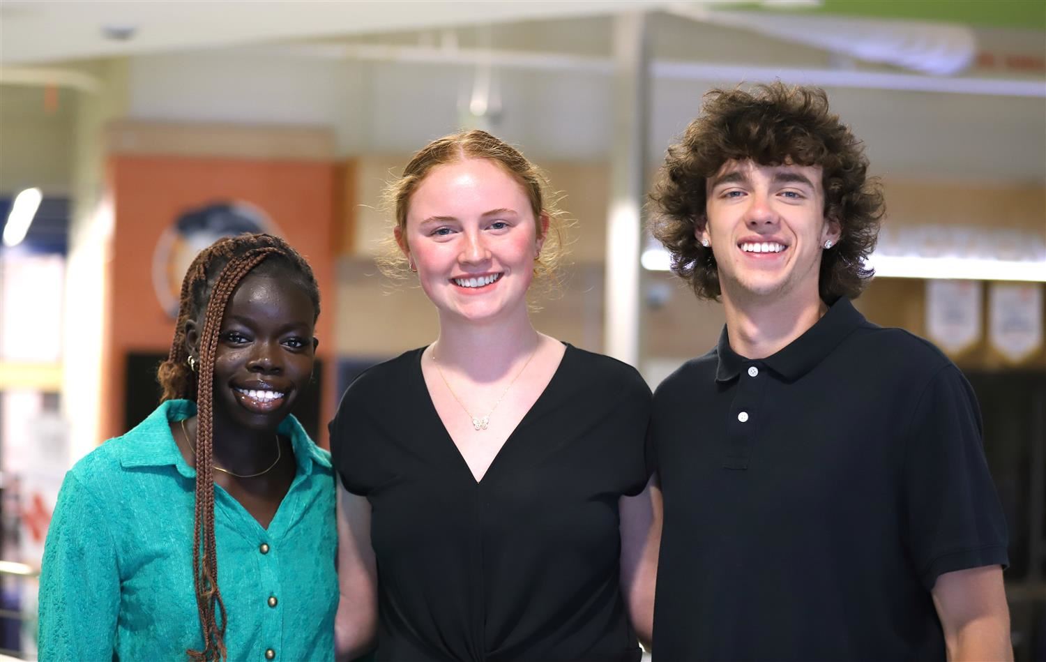 GISH student speakers: Nyarout Wal, Elli Ward, & Charlie Gentry.